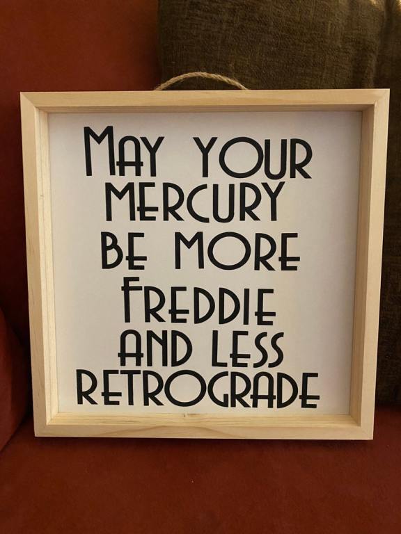 Freddie Mercury sign that says may your mercury be more freddie and less retrograde