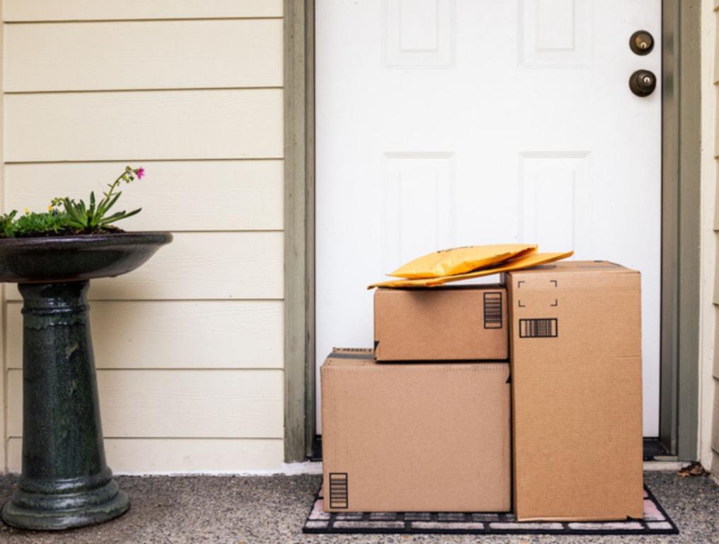 packages in front of door on front porch