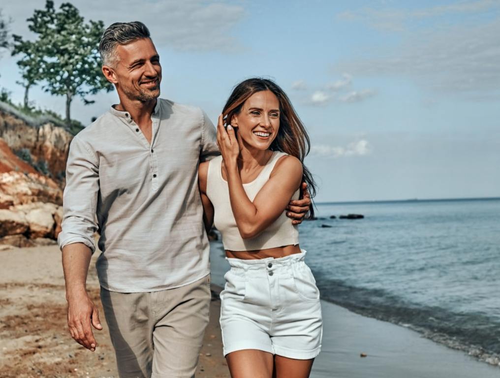 Man and woman couple on the beach.