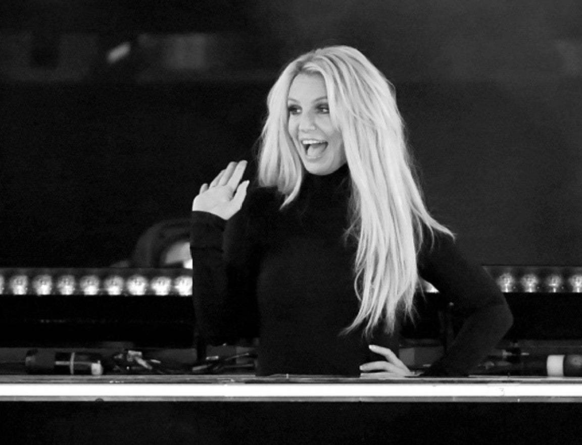 Singer Britney Spears waves as she attends the announcement of her new residency, "Britney: Domination" at Park MGM on October 18, 2018 in Las Vegas, Nevada.