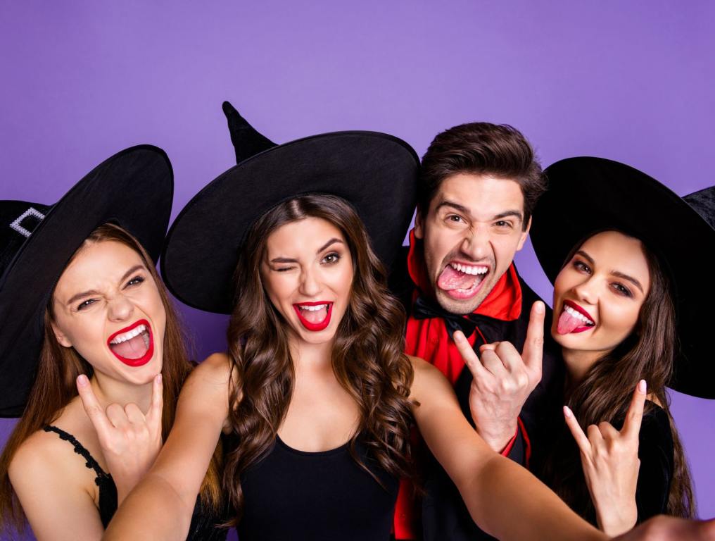 Ladies dressed up as witches with a guy dressed up for Halloween. Halloween is upon us, and it's time to pick a costume. So, what are the most popular Halloween costumes for 2024?