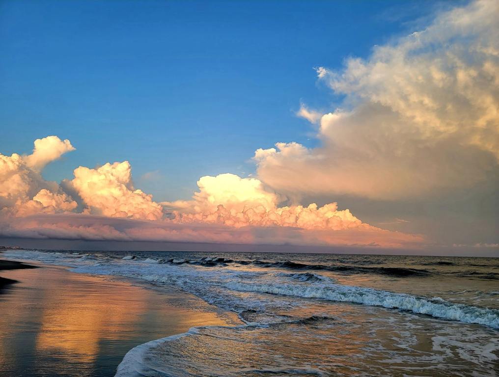 Sunset over a North Carolina beach. Experts have named one North Carolina beach one of the world's hidden gems and most underrated beaches.