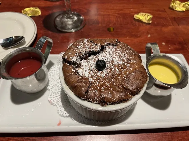 Chocolate Souffle with raspberry and creme anglaise. The chef at the Brentwood will be featured on Chef Swap At The Beach