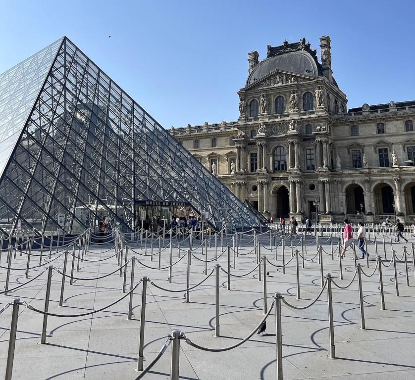 One hour after opening, there is uncharacteristically no line to enter the Louvre Museum.