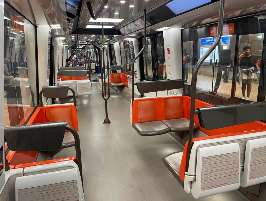 an empty subway car in Paris during the Olympics