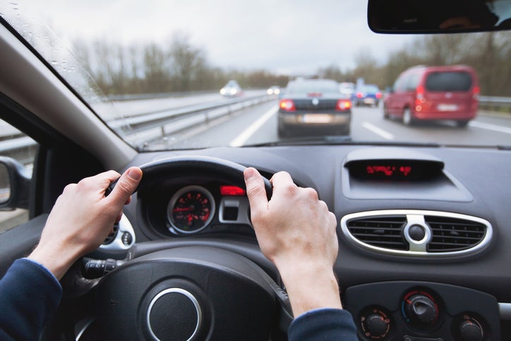 best cities for driving best city for driving driving car on highway, close up of hands on steering wheel