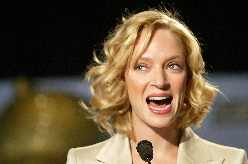 Uma Thurman looking like she's having fun at an event