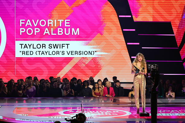 LOS ANGELES, CALIFORNIA - NOVEMBER 20: Taylor Swift accepts the Favorite Pop Album award for 'Red (Taylor’s Version)' onstage during the 2022 American Music Awards at Microsoft Theater on November 20, 2022 in Los Angeles, California. 