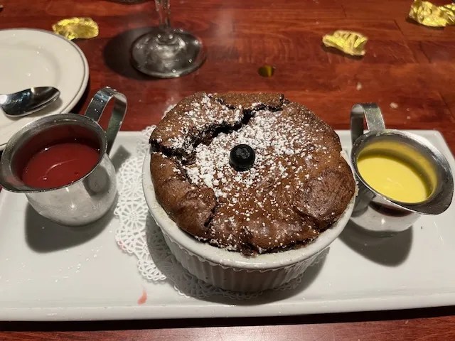 Chocolate Souffle with raspberry and creme anglaise. The chef at the Brentwood will be featured on Chef Swap At The Beach